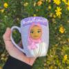 Handmade custom mug with a polymer clay portrait of a woman