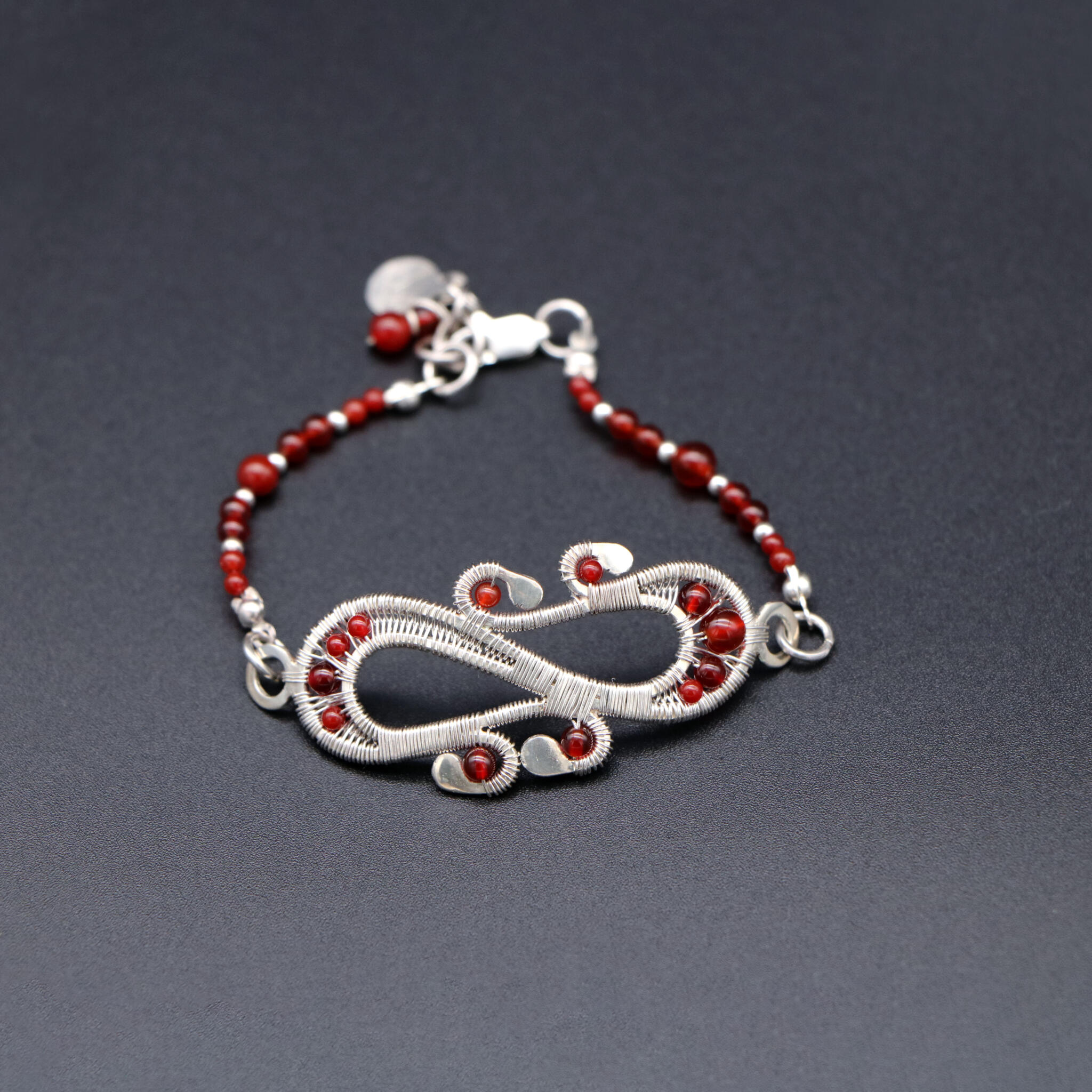 Silver bracelet with Agate gemstones (infinity design) 1 Silver bracelet with Agate gemstones (infinity design)