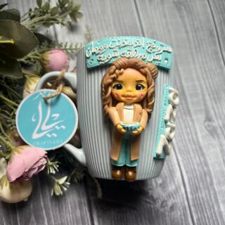 Handmade polymer clay mug with a customized cute girl figure holding coffee, designed to look like the owner, perfect for Mother’s Day and best friend gifts.