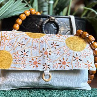 Nerm Wooden-beaded handle purse
