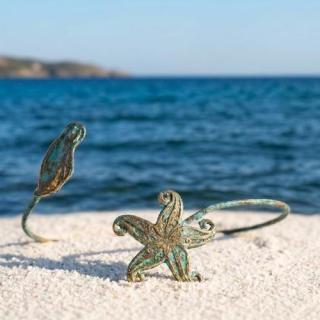 Adjustable Vintage sea star with baby turtle bracelet.