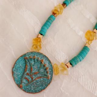 Turquoise, gold hematitec & citrine chips stones with bluerust Lotus pendant