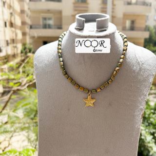 Adjustable hematite necklace with stainless pendant