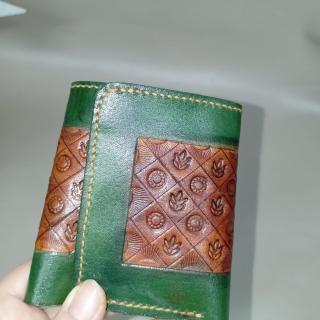 محفظه زخارف ثلاثيه هفان في اخضر