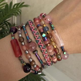 Stack of braided bracelets