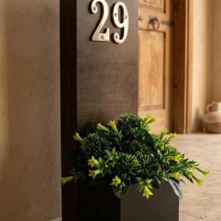 plain door sign with artificial floers