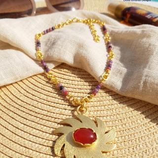 Gold plated brass necklace, a textured sun pendant with orange agate stone and small colored agates (N192XMG)
