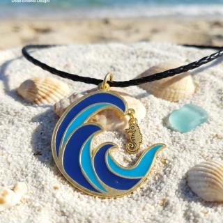 Gold plated brass necklace, colored waves pendant with a dangling seahorse in a leather choker (N189XG)
