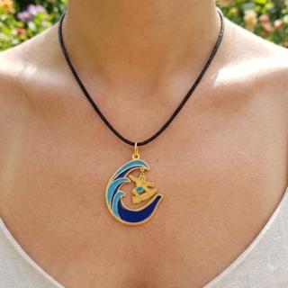 Gold plated brass necklace with a pendant of waves and a wave surfer (N190XMG)