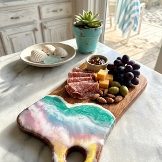 serving charcuterie board with colorful resin waves