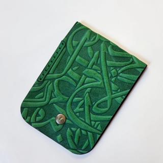 A Small Front pocket Minimalist Wallet with Embossed Abstract Arabic Calligraphy