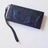 A Pull-Up Leather Wallet/Clutch with Embossed Mandala