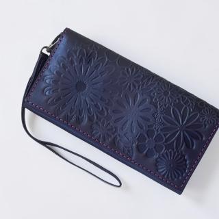A Pull-Up Leather Wallet/Clutch with Embossed Floral Pattern