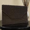 Golden strassy clutch