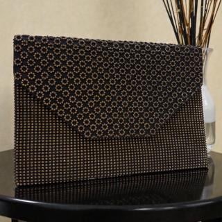 Golden strassy clutch