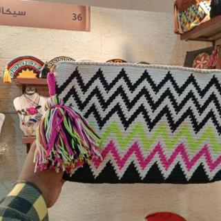 Tapestry clutch