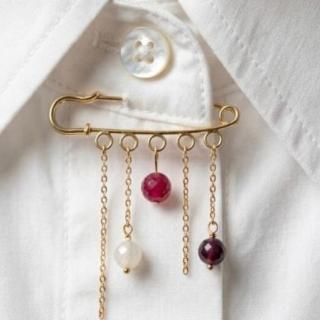 The muse brooch