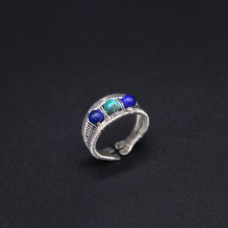 Silver ring with Lapis lazuli and turquoise gemstones.