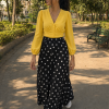 Black skirt with white polka dots