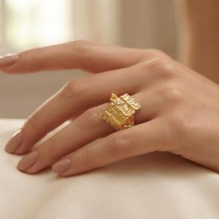 Gold plated textured Egyptian hieroglyphic ring.